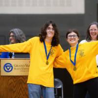 Participants posing after winning a medal